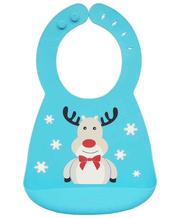 Blue bib with a reindeer design featuring antlers and a red bow tie, surrounded by white snowflakes. The bib has adjustable fastening and a wide base.