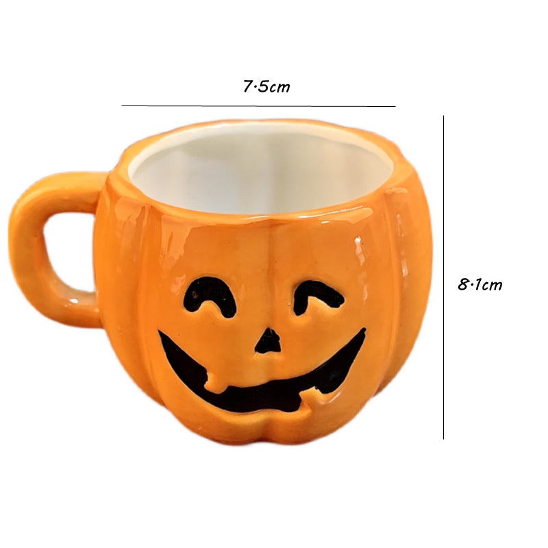 Orange pumpkin-shaped mug with a black smiling face design. The mug measures 7.5cm in width and 8.1cm in height, featuring a handle on the left side.