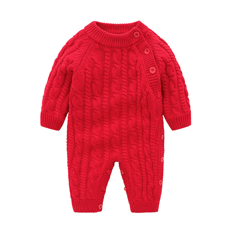 Red cable-knit baby romper with long sleeves and ribbed cuffs. Features button closure along the left side and at the bottom for easy dressing and diaper changes.