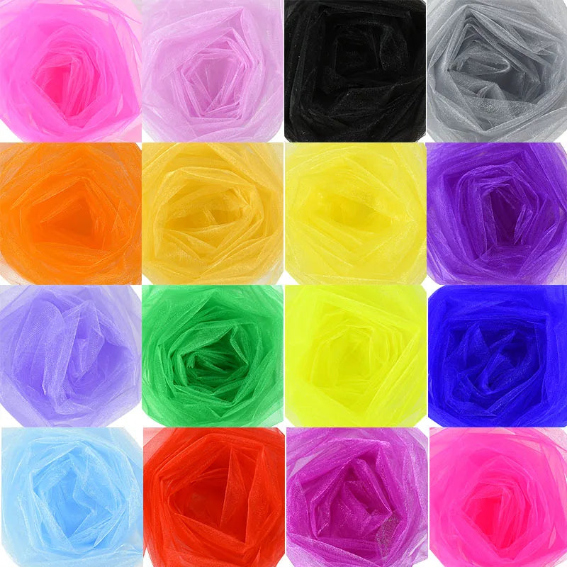 A grid of colorful tulle fabric swatches in 16 squares, featuring pink, purple, black, gray, orange, yellow, green, and blue hues, arranged in four rows of four.