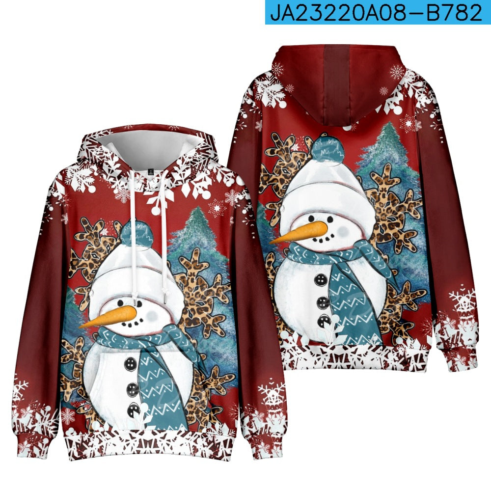 Red hoodies with a festive snowman design, featuring a carrot nose, button eyes, snowflakes, and green trees in the background. The snowman wears a blue scarf and hat.