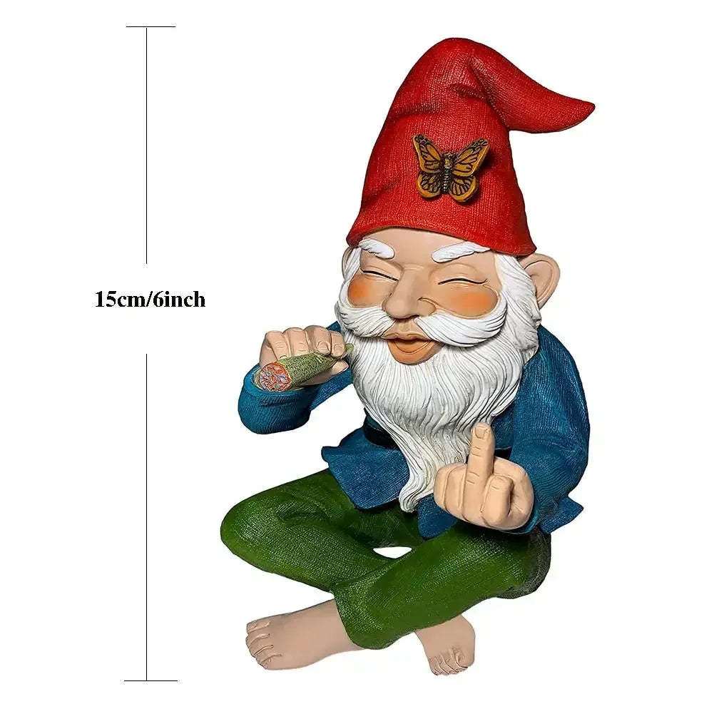 Cheerful garden gnome, 15 cm tall, with a red hat featuring a butterfly, wearing blue and green clothing, holding a joint, and playfully showing a hand gesture.