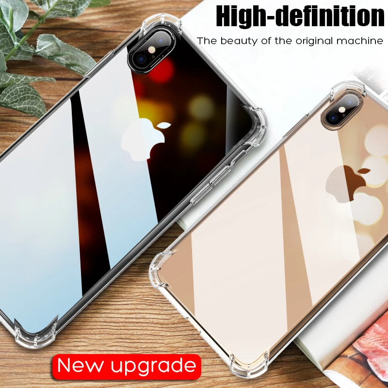 Transparent iPhone cases on a wooden table, reflecting colorful lights. Text reads "High-definition" and "New upgrade" in bold. Green leaves are in the background.