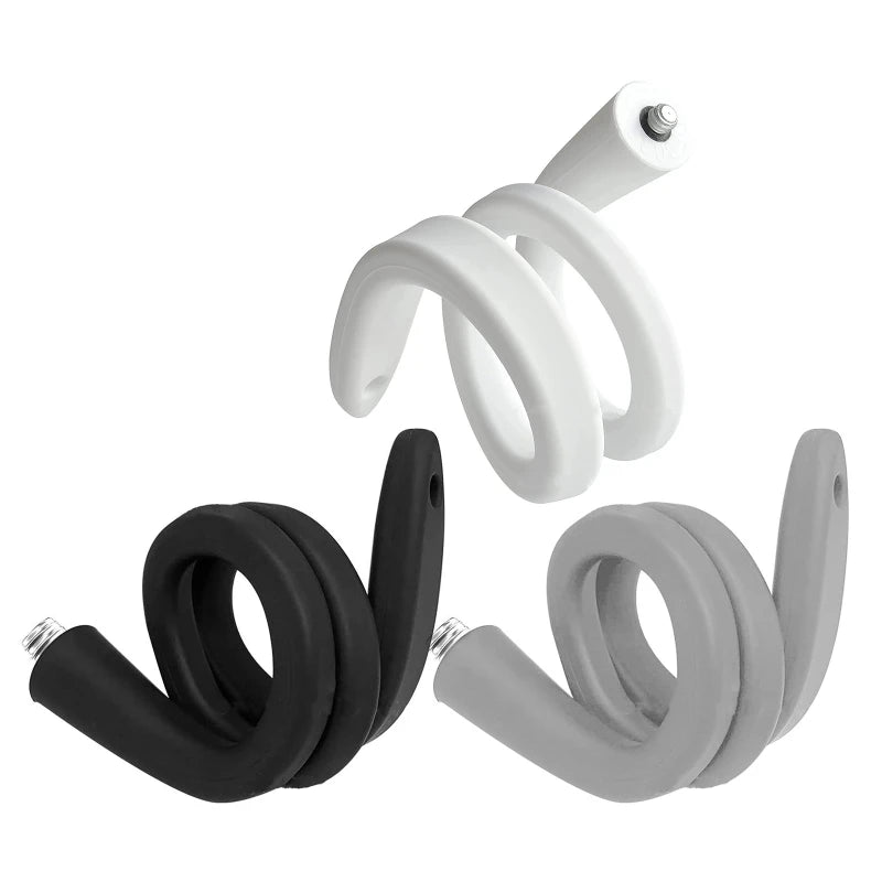 Three twisted LED light bulbs in black, white, and gray, each with a spiral design and smooth surface. They are arranged with one on top and two below, against a white background.