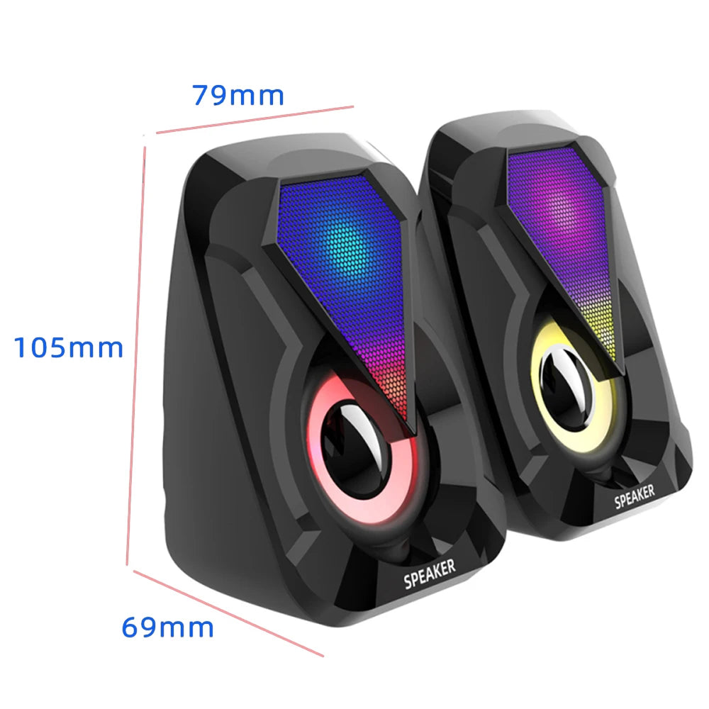 Two black speakers with colorful LED lights on top and around the cones. Dimensions are 105mm tall, 79mm wide, and 69mm deep. Each speaker has "SPEAKER" written at the bottom.