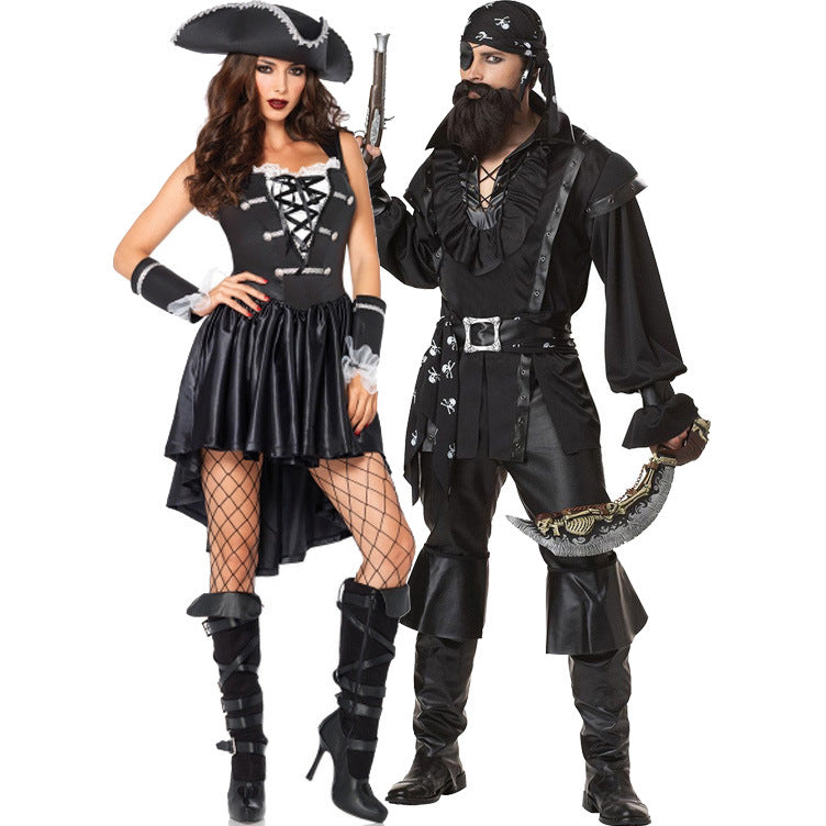 A woman and a man in pirate costumes; she wears a high-low skirt, corset top, fishnet stockings, and hat. He has an eye patch, beard, black outfit, and holds a sword.