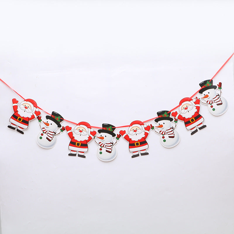 Festive garland featuring alternating cutouts of Santa Claus and snowmen, each with cheerful expressions, hanging on a red string against a white background.