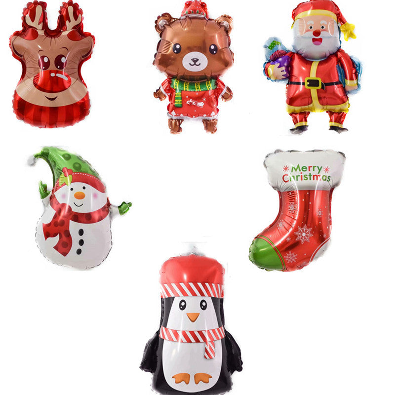 Christmas-themed balloons featuring a reindeer, bear, Santa, snowman, penguin, and a red stocking with "Merry Christmas." Each character is festively dressed.