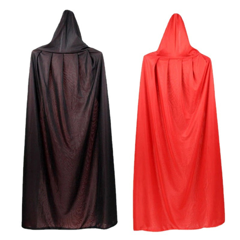 Two hooded cloaks displayed side by side against a white background. The left cloak is black, and the right cloak is red. Both have a silky texture with slight drapes and folds, designed for a dramatic, flowing appearance.