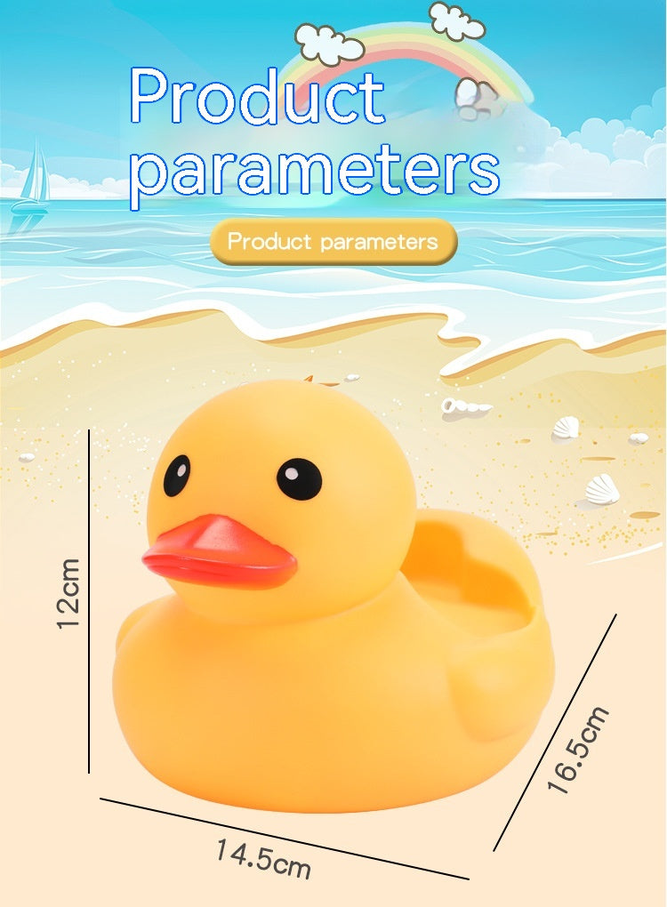 Yellow rubber duck with dimensions 12cm x 14.5cm x 16.5cm on a sandy beach background. Text reads "Product parameters." A sailboat, sea, clouds, and rainbow are visible.