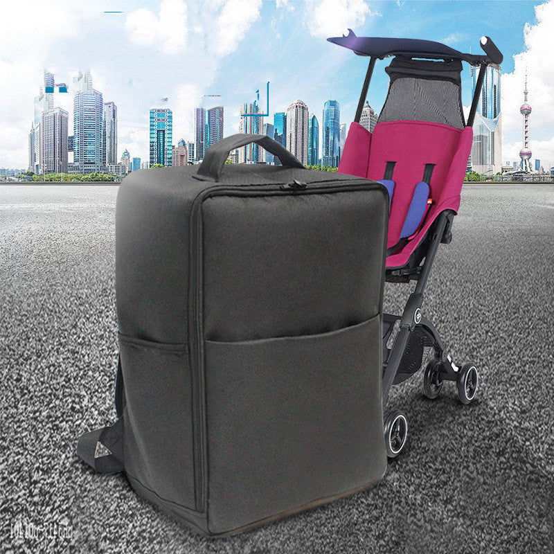 A black stroller with a dark pink seat is parked on a paved surface with a cityscape in the background, under a blue sky with scattered clouds.