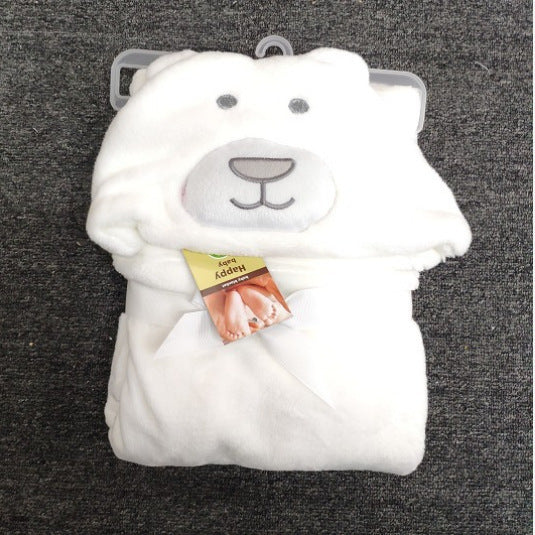 White baby blanket with an embroidered bear face hood, neatly folded and tied with a white ribbon. It has a tag that reads "Happy Baby" on a gray hanger against a dark surface.