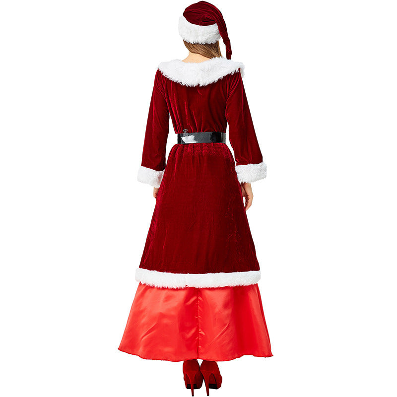 Rear view of a person wearing a red and white Santa-themed dress with a matching hat. The dress features a black belt and white fur trim. The person is also wearing red high heels.