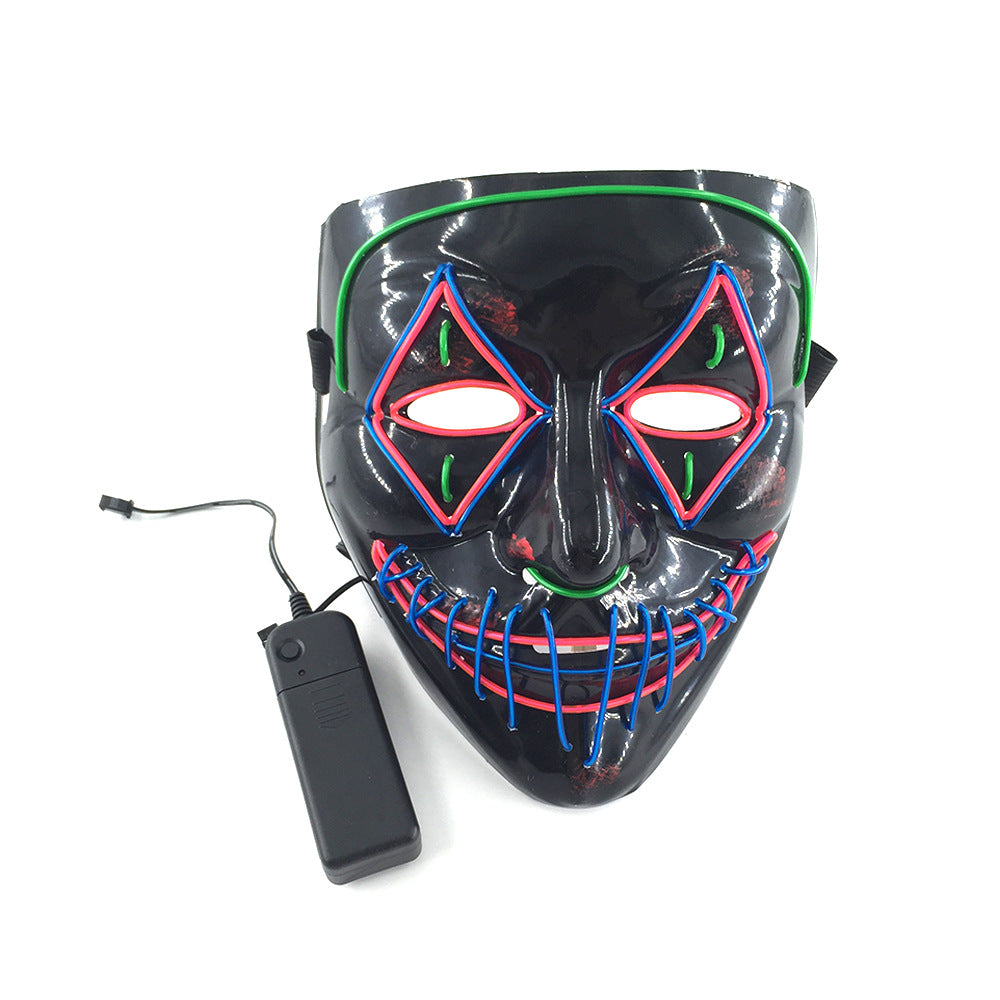 LED mask with black surface and colorful neon accents in red, blue, and green around the eyes and mouth. Attached battery pack with a wire for power.