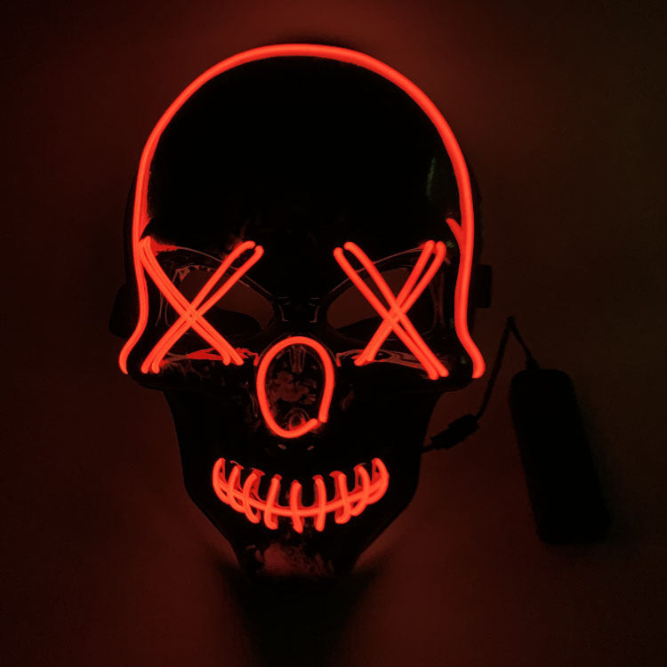Glowing skull mask with red neon outlines, featuring X-shaped eyes and stitched mouth, set against a dark background, creating an eerie effect.