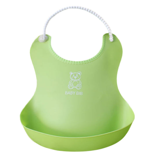 Green silicone baby bib with a white teddy bear design and "Baby Bib" text. It features a wide food catcher pocket and an adjustable strap with white beads.