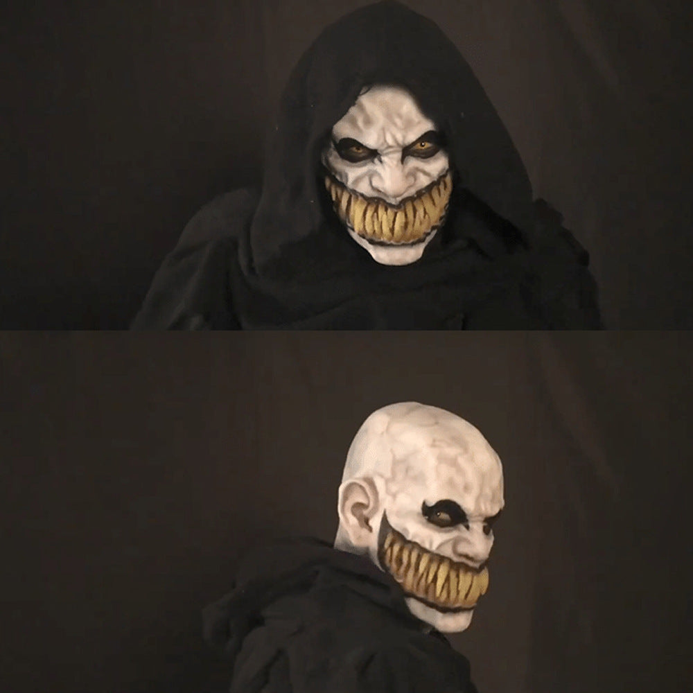Scary makeup transformation with a sinister grin. Top image shows a cloaked figure facing forward, bottom shows side view of bald head with exaggerated teeth and dark eye makeup.
