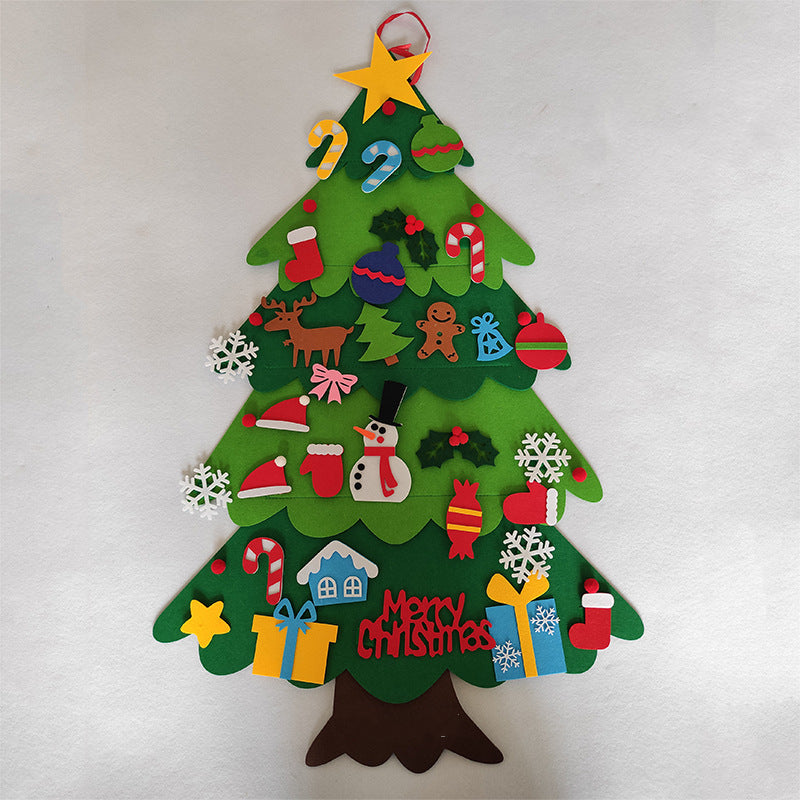 Felt Christmas tree with ornaments including a star, candy canes, snowman, gingerbread man, reindeer, stockings, presents, snowflakes, and "Merry Christmas" message.