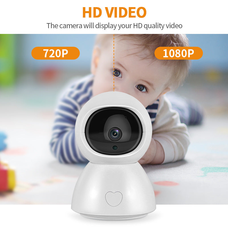 A baby in the background is captured by a HD camera in the foreground, displaying a comparison between 720p and 1080p video quality, highlighting the clarity difference.