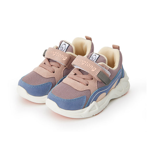 Children's sneakers with pink and blue panels, featuring Velcro straps, mesh fabric, and chunky white soles. The sneakers have a playful, sporty design on a white background.