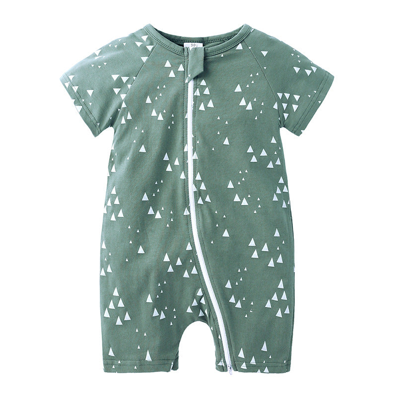 Green baby romper with short sleeves and a front zipper, featuring a pattern of small white triangles.