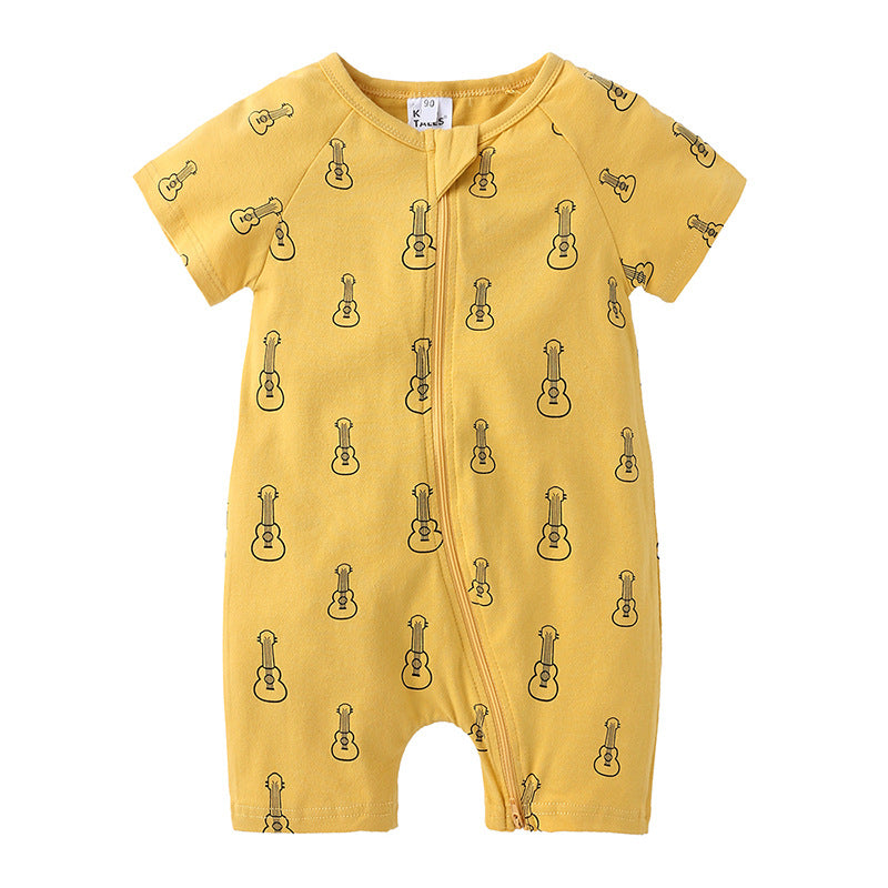 Yellow baby romper with short sleeves, featuring a playful pattern of small guitars. The romper has a zipper front for easy dressing.