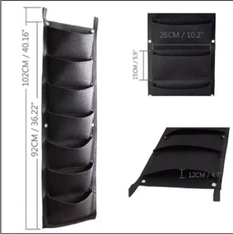 Black hanging organizer with five pockets. Dimensions: 102 cm tall, 26 cm wide, 15 cm per pocket height, 12 cm pocket depth when laid flat. Suitable for various storage needs.