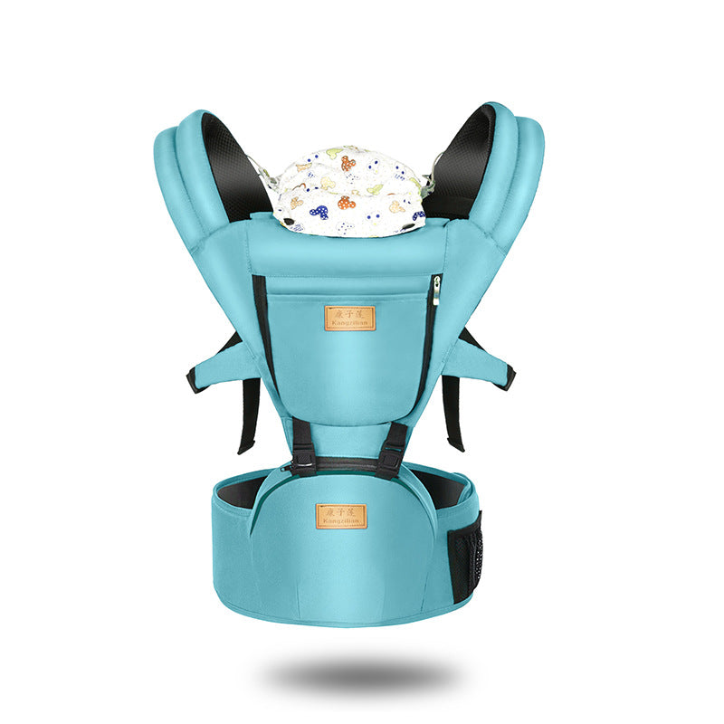 Turquoise baby carrier with padded straps and waist support. Features a front pocket, adjustable buckles, and a white patterned cloth cover on top. Suitable for ergonomic baby wearing.