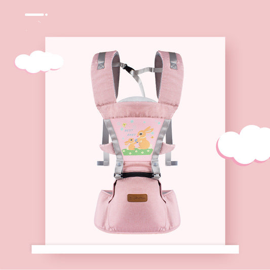 Pink baby carrier with adjustable straps, featuring a cute rabbit design on the front. It has a cushioned seat and a small pocket, set against a pink background with white clouds.