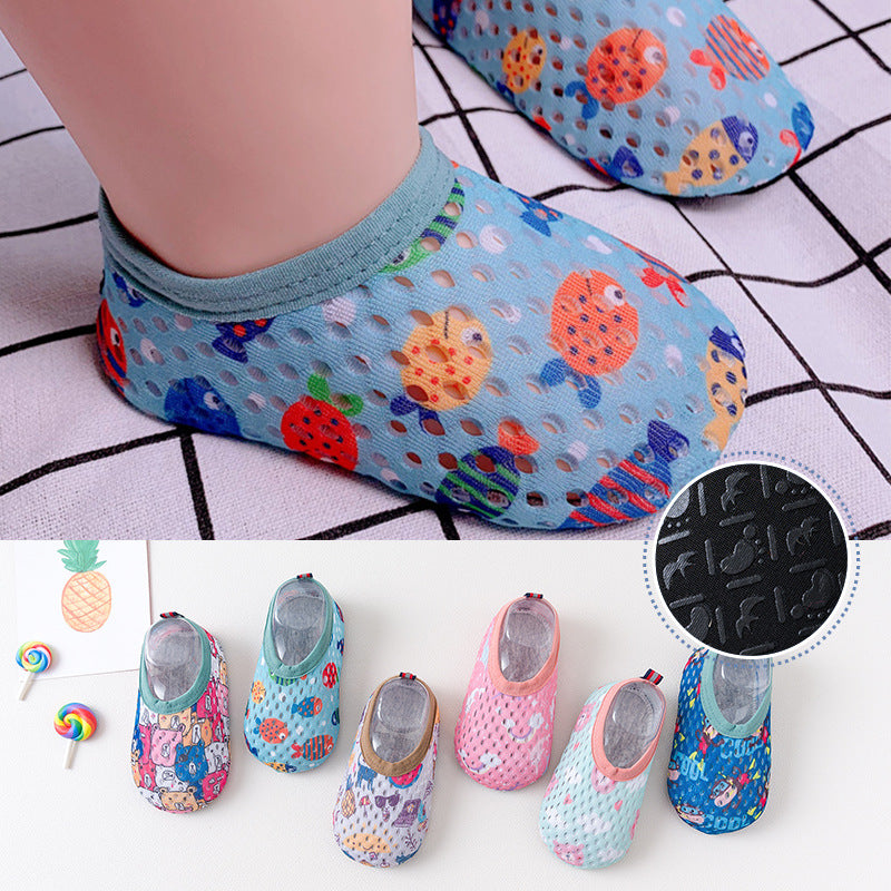 Colorful mesh baby socks with cartoon patterns on feet, shown on checkered background. Additional varieties displayed below, with image of anti-slip sole texture.