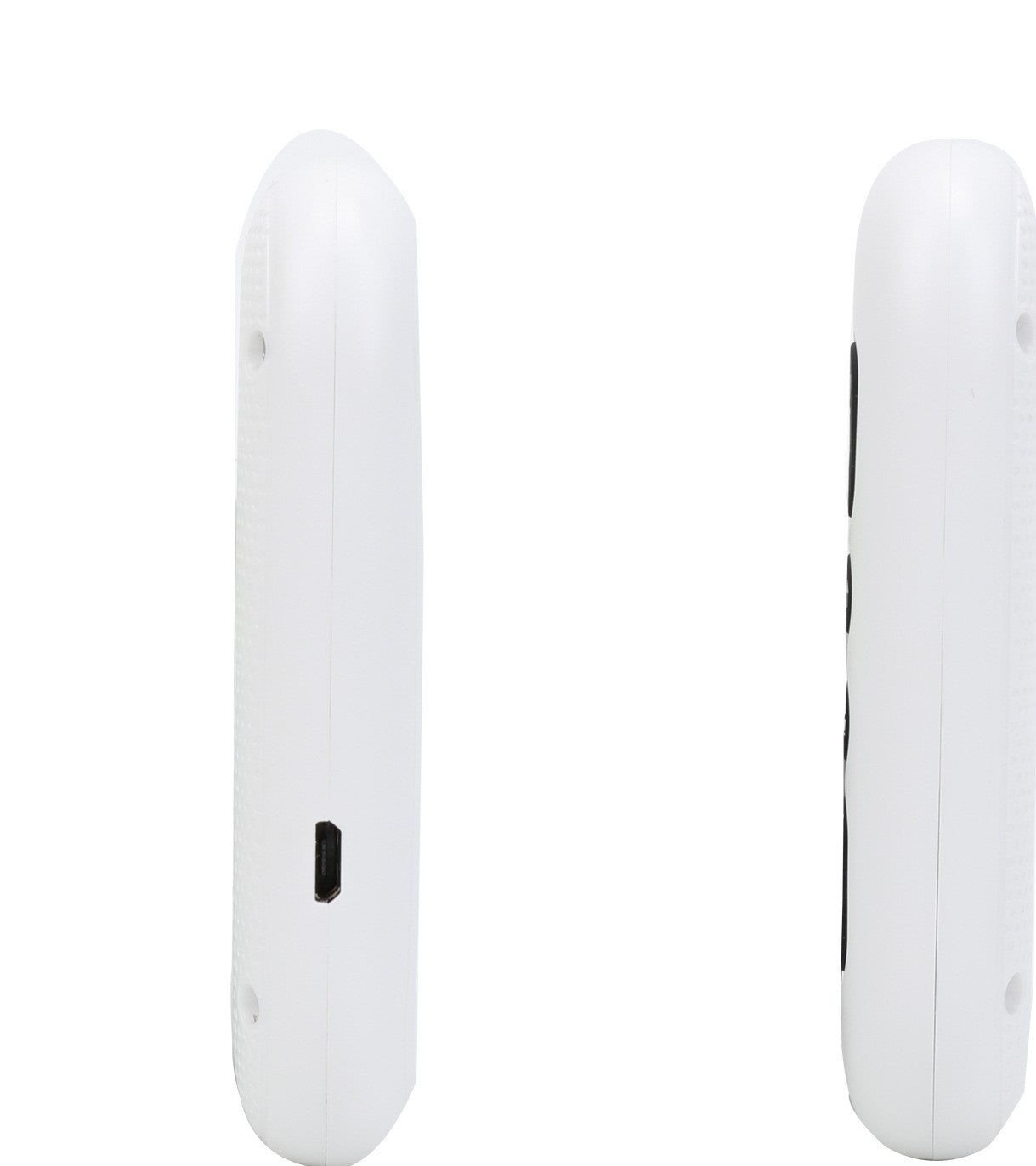 Side view of two white, oval-shaped remote controls. One on the left shows a USB port, while the right one reveals black buttons. Both have rounded edges.