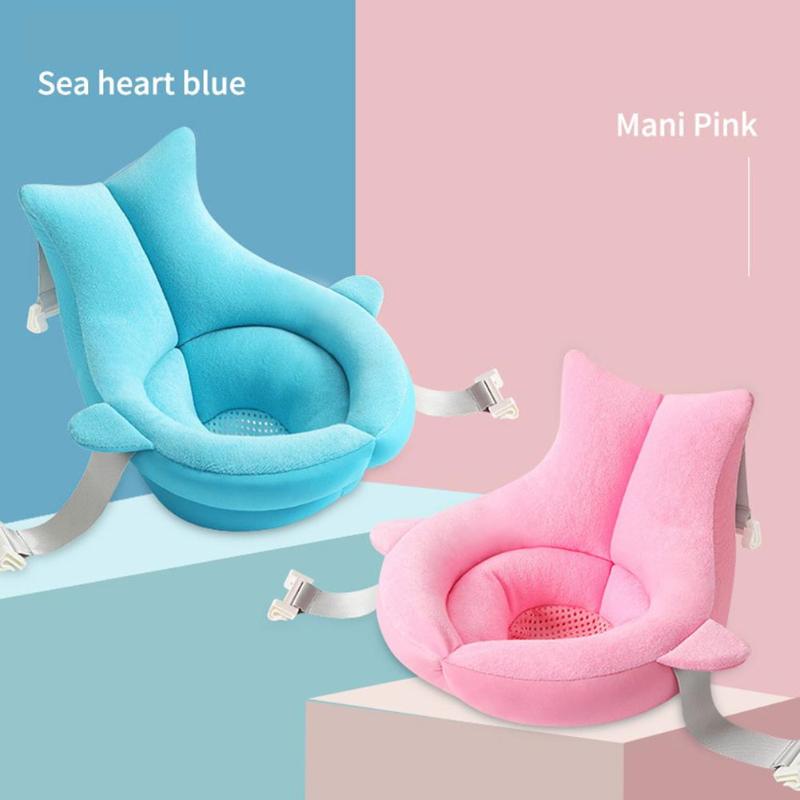 Two plush baby seats are shown: one in sea heart blue and the other in mani pink. Both seats have supportive backs and safety straps, set against a split blue and pink background.