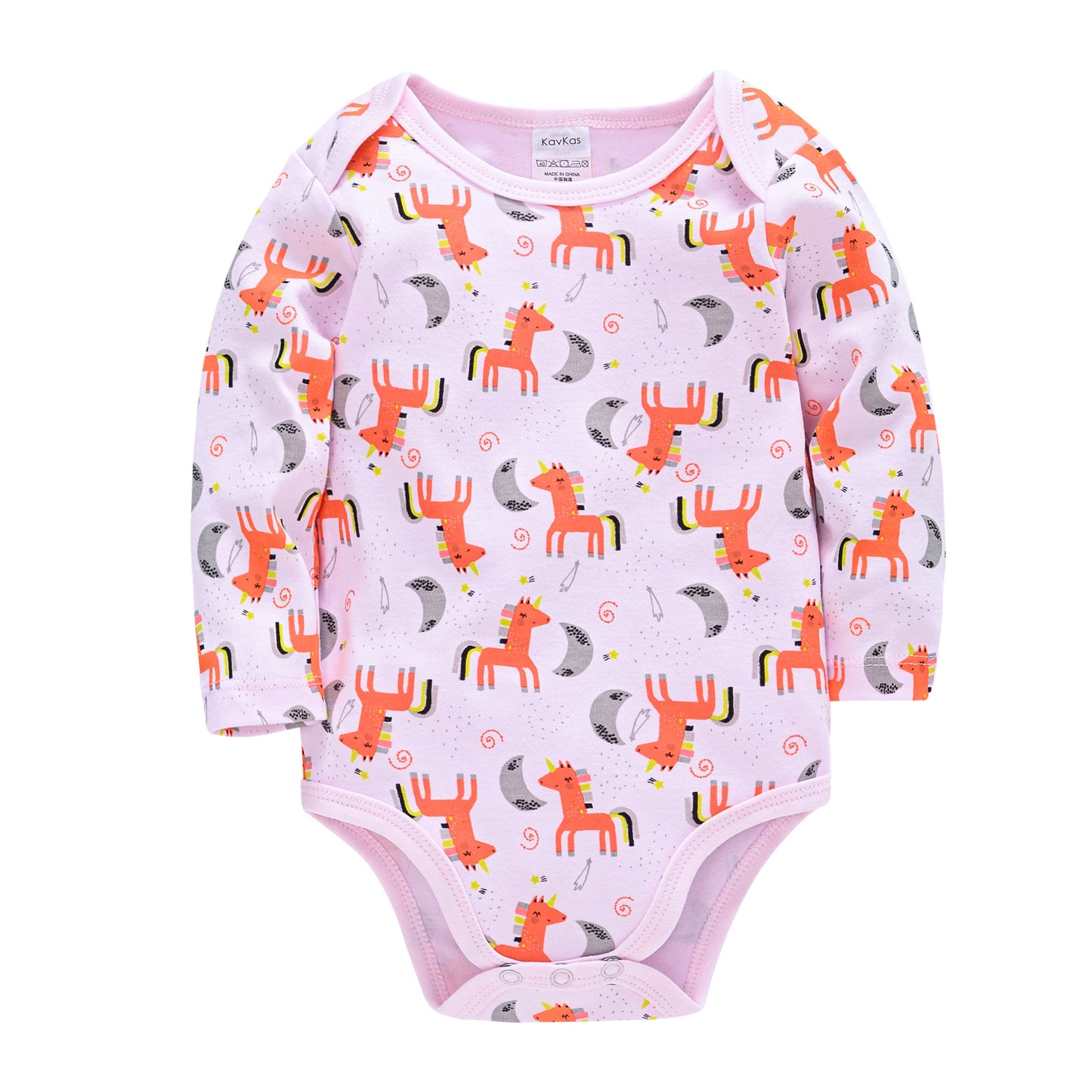 Pink baby onesie with long sleeves, adorned with a whimsical pattern of orange unicorns, gray moons, stars, and candy swirls.