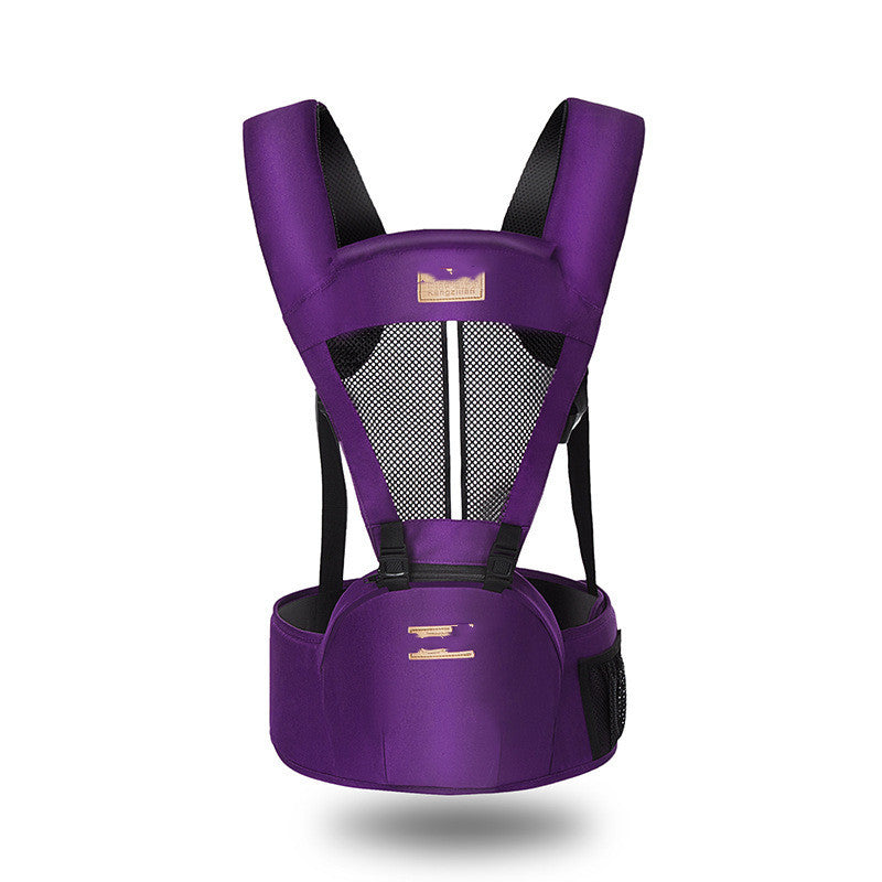 Purple ergonomic baby carrier with black mesh back panel for ventilation. Features padded shoulder straps and a wide waistband for support. Front storage pocket included.