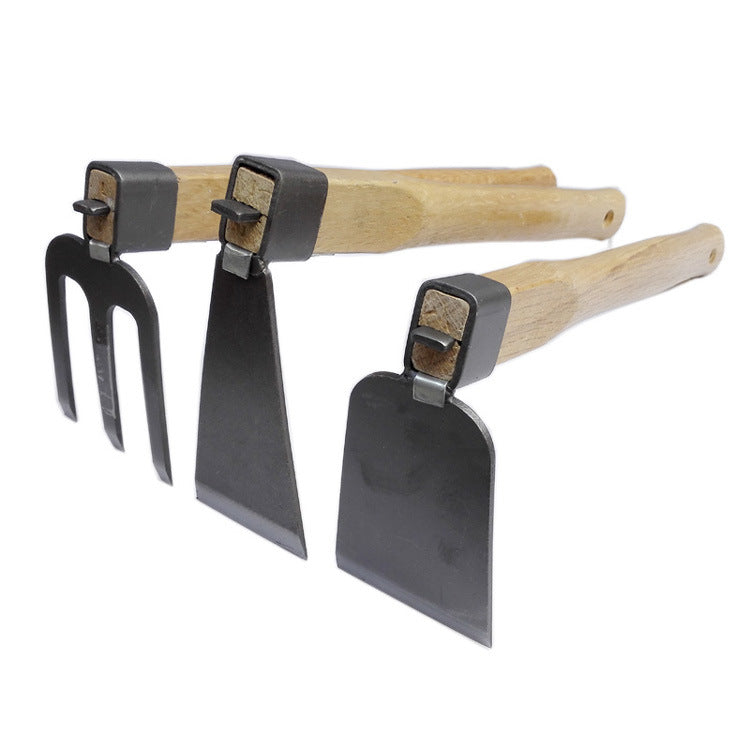 Three gardening tools with wooden handles and black metal heads: a fork, a hoe, and a shovel, are arranged side by side against a white background.