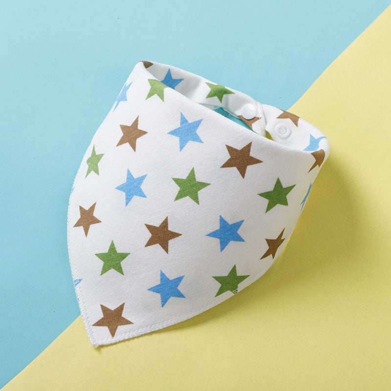 White baby bib with blue, green, and brown stars printed on it, featuring a snap closure. The bib is displayed against a split blue and yellow background.