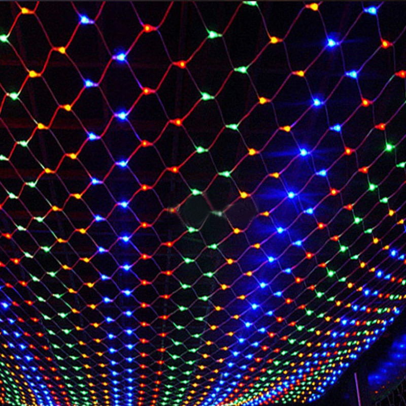 A ceiling decorated with a grid of LED lights in blue, red, and green colors, creating a vibrant and colorful pattern against a dark background.