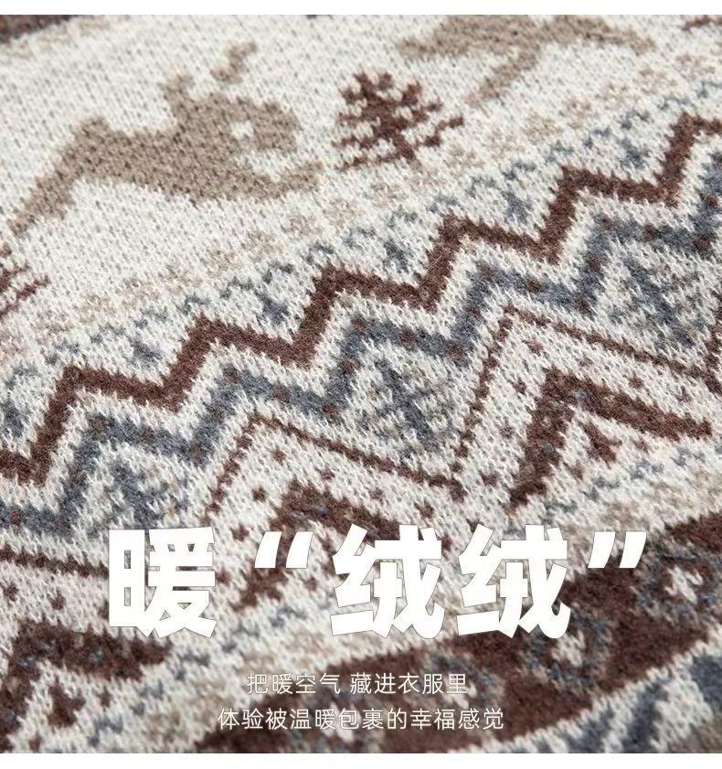 Knitted fabric with zigzag and reindeer patterns in earthy tones. Chinese text over the fabric translates to "Warm Knitting," emphasizing warmth and comfort.