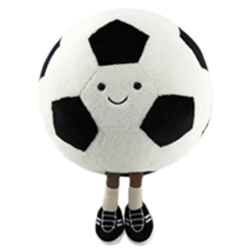 Smiling plush soccer ball with two legs and black shoes, featuring a friendly face on its surface.