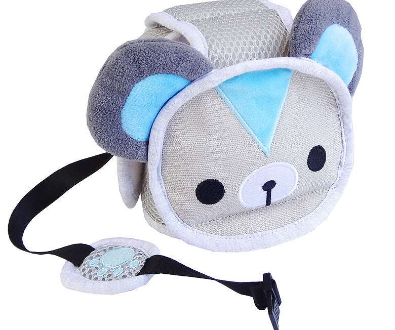 Cute bear-themed plush backpack in beige with blue accents and gray ears. Features a black strap and a decorative paw print clasp. Suitable for children.