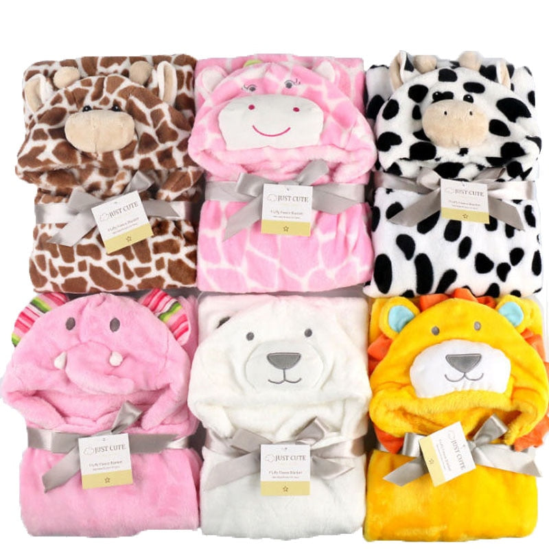 Six plush animal-themed blankets folded and tied with gray ribbons, featuring designs of a giraffe, hippo, cow, elephant, polar bear, and lion, showcasing various pastel colors.