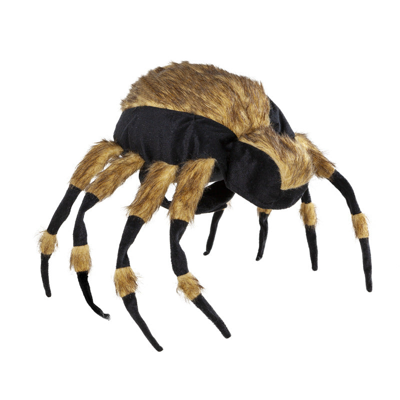 Toy tarantula with a furry brown and black body and legs, posed as if crawling.