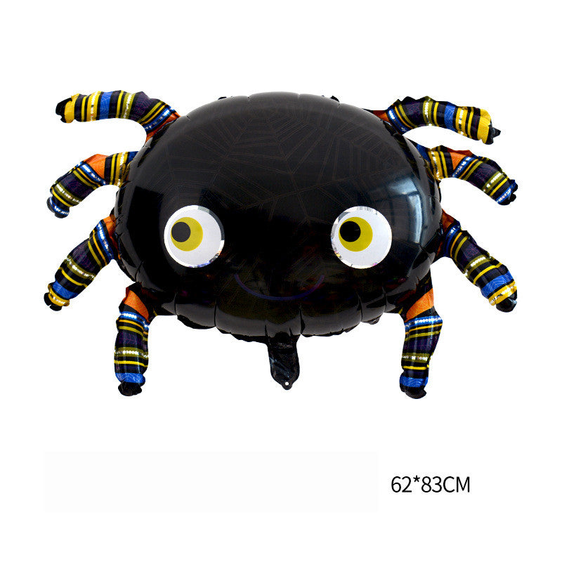 Cartoon spider balloon with a shiny black body and colorful striped legs. It features large round eyes and a small smile. Dimensions are 62cm by 83cm.