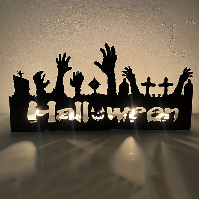 Silhouette of hands and tombstones with the word "Halloween" lit up from behind, creating an eerie glow on a textured background.