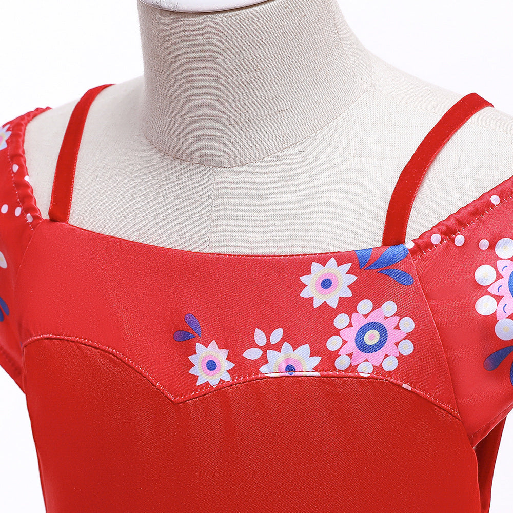 Red dress on a mannequin with thin straps, featuring white and pink floral patterns on the bodice. The fabric has a satin-like texture, adding a smooth sheen.
