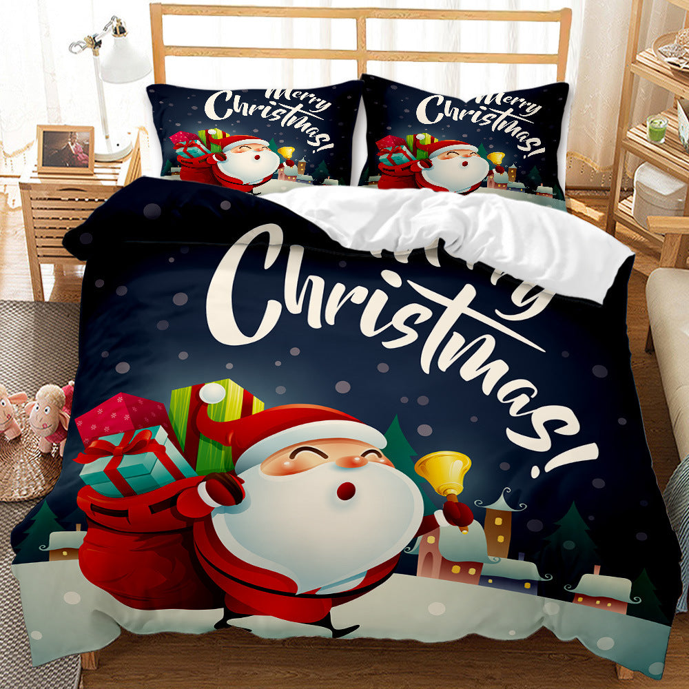 Festive bedding with Santa Claus carrying gifts and ringing a bell, set against a snowy night backdrop with "Merry Christmas" text on pillows and duvet. Cozy holiday decor.