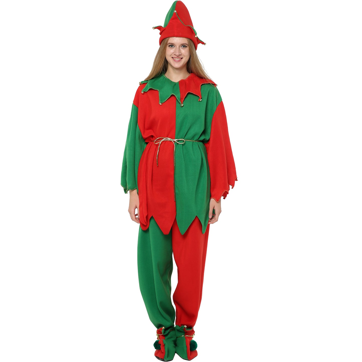 Person wearing a green and red elf costume with a pointed hat and a rope belt, smiling against a white background. The outfit includes decorative shoes and jagged edges.