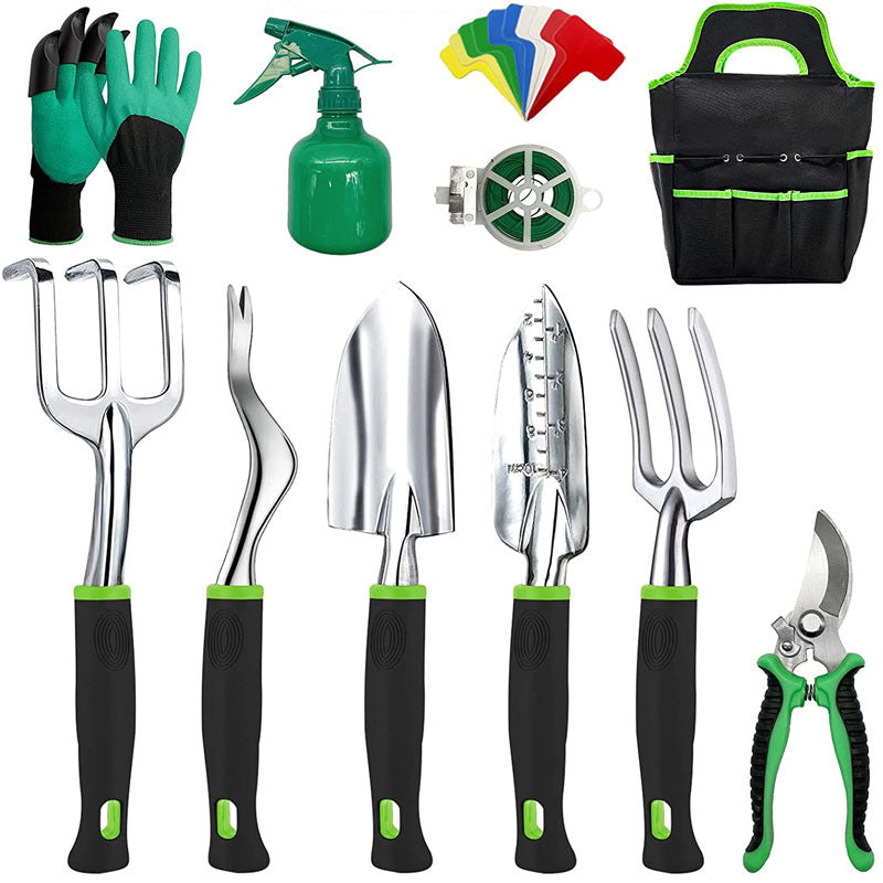 Garden tool set with gloves, spray bottle, plant labels, twine, tote bag, and seven tools including trowel, transplanter, hand rake, weeder, fork, and pruner, all with green accents.