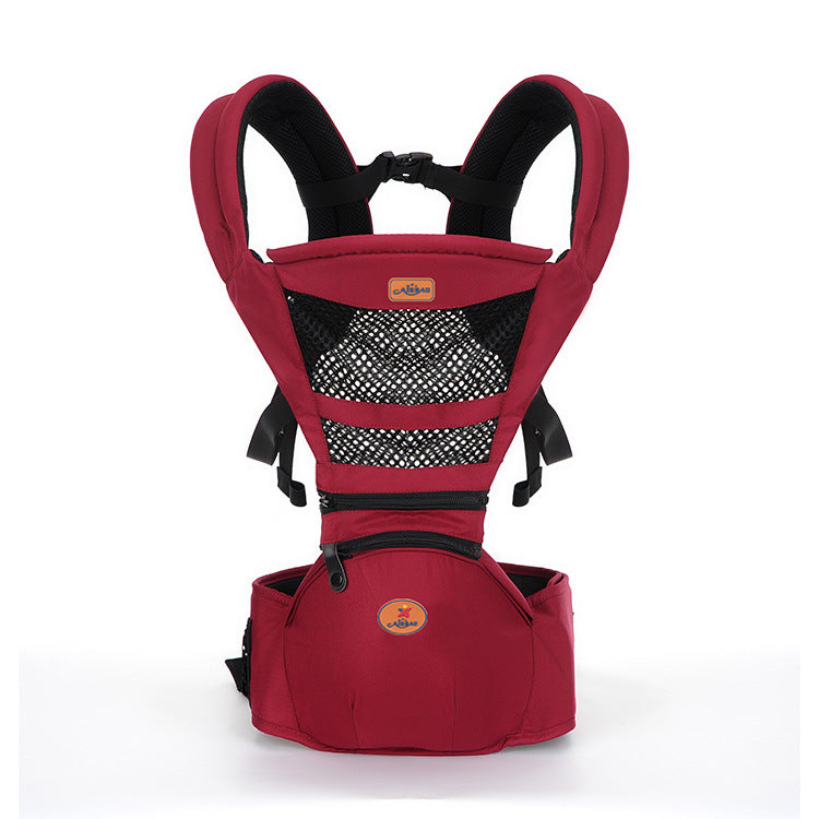 Red baby carrier with adjustable black straps and mesh ventilation. Features a small front pocket and sturdy hip seat for support. Ideal for comfortable and safe baby transport.