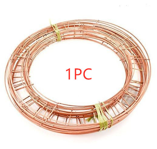 Coiled copper wire with two green bands securing it. The text "1PC" is overlaid in red in the center. The wire is arranged in a circular shape on a plain background.